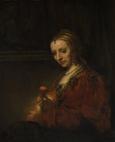 Kvinne med en rosa, tidlig på 1660-tallet. av Rembrandt van Rijn