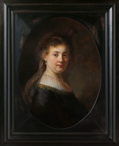 Ung kvinne i fantasykostyme av Rembrandt van Rijn