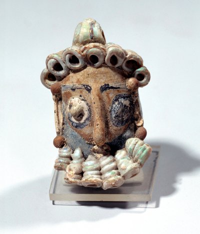 Orientalsk antikk: amulett i form av et hannhode funnet i en grav i Kartago. Punisk periode, lakkert land. 400-300 f.Kr. Paris, Louvre-museet av Roman