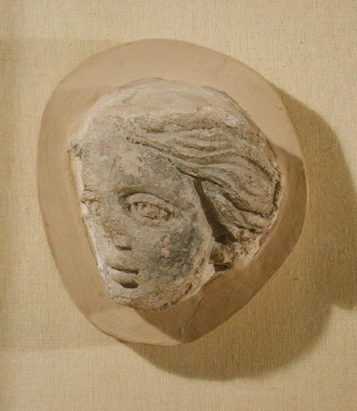 Relieff som viser hodet til en kvinne, fra Tunisia (stukk) av Roman