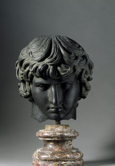 Romersk kunst: representasjon av Antinous (eller Antinoo, ca. 110-130), ung mann elsker keiser Hadrian. Bronseskulptur. Firenze, Museo Archeologico av Roman