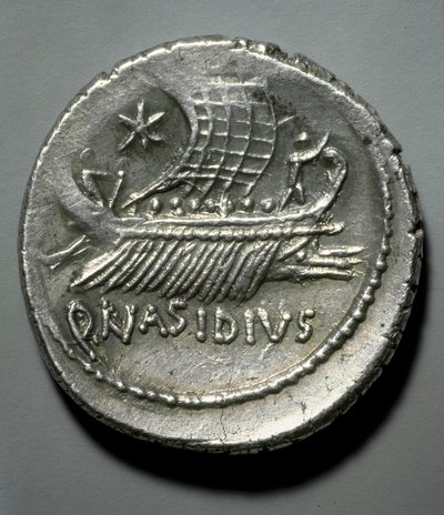 Romersk kunst: sølvmynt avbildet av en bysse utstyrt med et system for å styrte fiendtlige skip. Paris, B.N. Cabinet des Medailles av Roman Roman