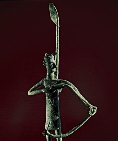 Nuragisk kultur (nuraghi) sardinsk: statuett av kriger som trekker en bronsebue. 8.-7. århundre f.Kr. Cagliari, Nasjonalt arkeologisk museum, Sardinia, Italia av Sardinia Nuragic Civilization