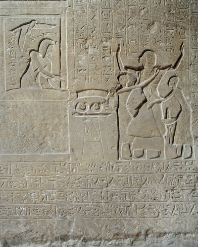 Egyptisk antikvitet: relieff i kalkstein fra Hormin: Sethi I deler ut tapperhetskragene som en belønning for sitt mot til Hormin, leder av kongens harem. 19. dynasti (1295-1186 f.Kr.). Paris Louvre-museet av School Egyptian