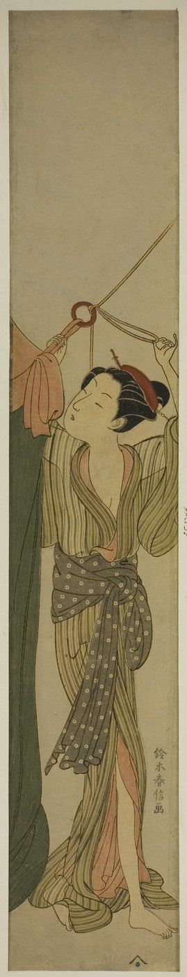 Henger opp et myggnett av Suzuki Harunobu