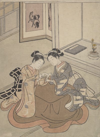 To unge kvinner sitter ved en Kotatsu lekende katteholder, ca. 1765., ca. 1765. av Suzuki Harunobu