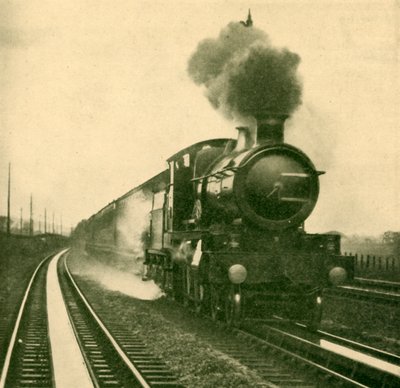Eine Lokomotive der Star-Klasse nimmt bei hoher Geschwindigkeit Wasser auf, Goring, Great Western Railway, 1930 von Unbekannt