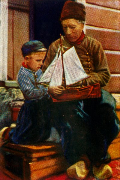 Nederlandsk far og sønn i tradisjonell kjole, c1928. av Unbekannt
