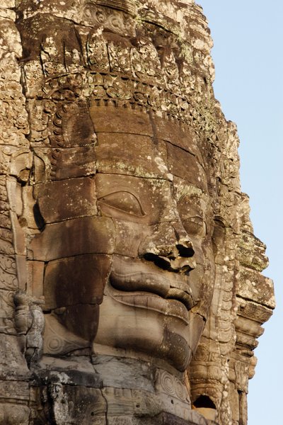 Steinansikter på tårn i Bayon-tempelet i Angkor Thom som kan skildre Jayavarman VII som en bodhisattva., Siem Reap, Kambodsja av Unbekannt