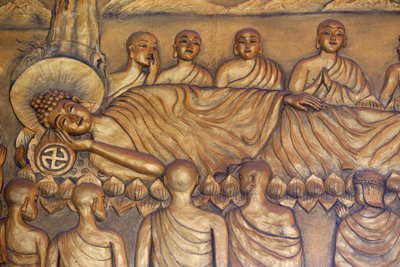 Chua Thiep Long buddhistpagode. Liggende Buddha. Etter 45 år med undervisning i Dharma, gikk Buddha over i Parinirvana. Statue. Thay Ninh. Vietnam av Unbekannt
