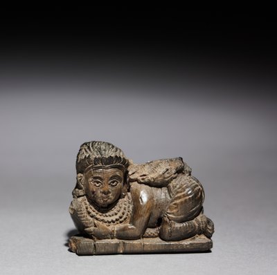 Figur av en hukende kvinne, 900-800 f.Kr av Unbekannt