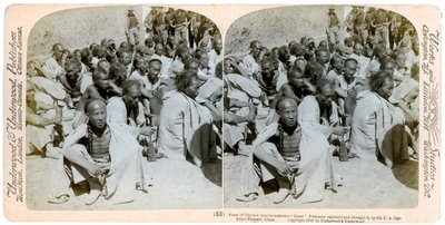 Bokserfanger tatt til fange og brakt inn av US 6th Cavalry, Tientsin, Kina, 1901. av Underwood and Underwood