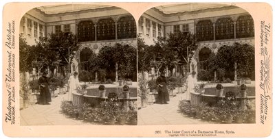 Den indre forgården til et hjem i Damaskus, Syria, 1900. av Underwood and Underwood