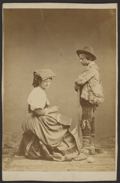 [Kvinne syr mens gutt ser på] av Unknown artist
