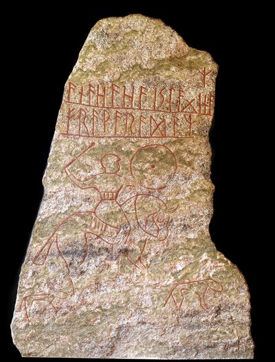 En stele med runeinnskrifter som representerer en vikingrytter med en hund (stein) av Viking Viking