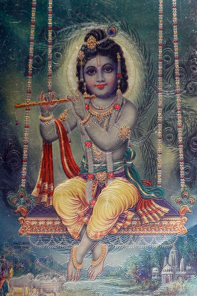 Lord Krishna med fløyte. hinduistisk gud. av . .