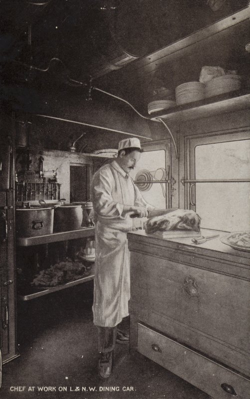 Kokk på jobb på L og NW Dining Car (s/hv-bilde) av (after) English photographer