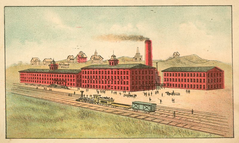 Jernbanelinje foran fabrikken til Oval Churn Company av American School