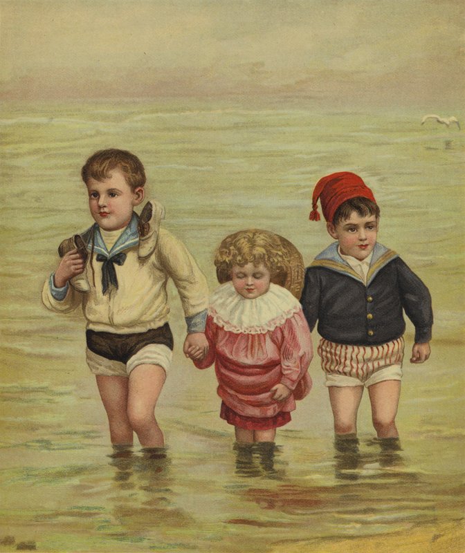 Barn som padler på stranden av English School
