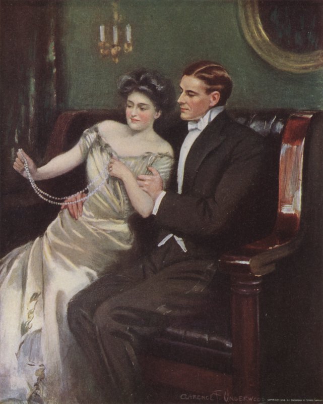 Kvinne som mottar et perlekjede i gave av Clarence F. Underwood