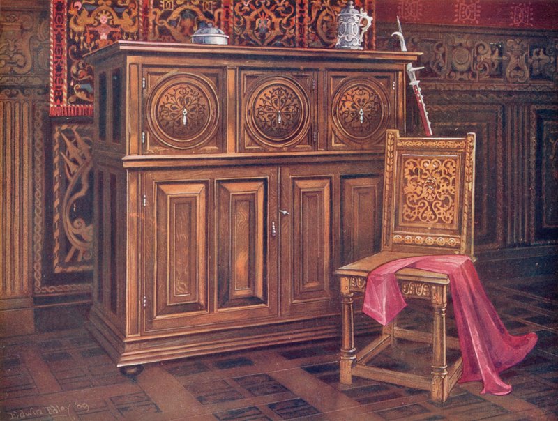 Eikeskap, med sirkulære konvekse paneler, innskåret arabesk ornament. Valnøttstol, med sammenflettet ornament av Edwin John Foley