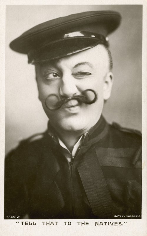 Kvinne i uniform og bart (s/hvitt bilde) av English Photographer