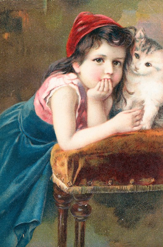 En ung jente poserer med en katt av English School