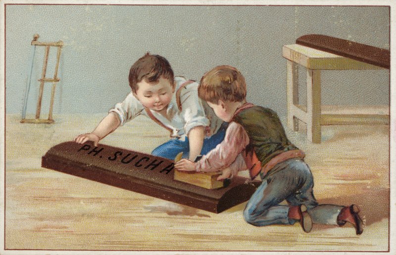 Barn konstruerer en stor sjokoladebar i tre, og reklamerer for Suchard-sjokolade av French School