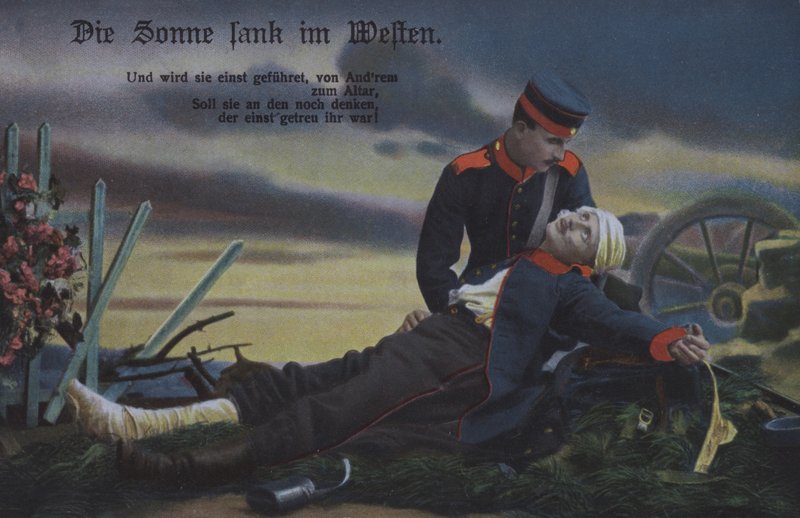 Solen gikk ned i vest: en tysk soldat som trøster sin døende kamerat på slagmarken (farget bilde) av Photographer German