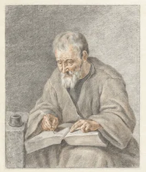 Gammel mann skriver i bok