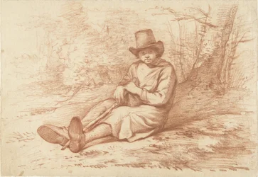 Sittende gutt med hatt og stokk, ved et tre