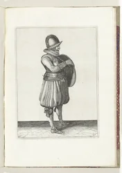 Skjold- og piggøvelsen: Soldaten trekker armen fra skjoldets belte (nr. 25), 1618 Nassausche Wapen-Handelinge, van Schilt, Spies, Rappier and the Targe: beyde figuerlick avbildet, og innrammet etter den nye orden [av] (...) Maurits