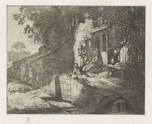 Kvinne spinner foran et hus