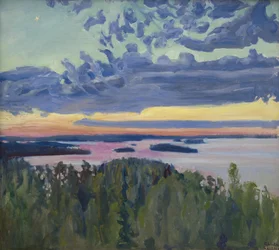 Solnedgang over en innsjø.