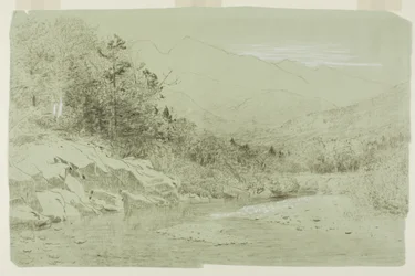 Elvestrøm med fjell i det fjerne