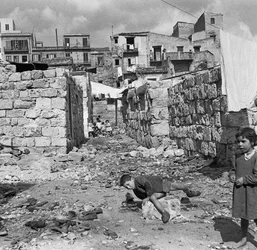PALERMO et glimt av en fattig bydel, hvor gatene fortsatt var dekket av ruiner, rester av bombingen i 1943