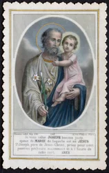 Fromt bilde: Jesus som et barn i armene til Josef (gravering)