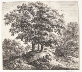 Sittende mann og kvinne ved et hull