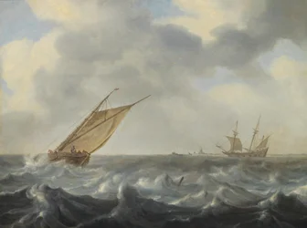 En fiskekutter og en tomaster i urolig sjø nær en kyst
