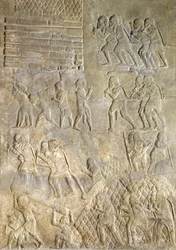 Relieff som viser bærere som bringer ved til kysten for transport til sjøs. fra Palace of Sargon II, Khorsabad, Irak