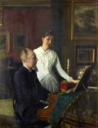 Skuespiller Peter Jerndorff og kona Amalie ved pianoet