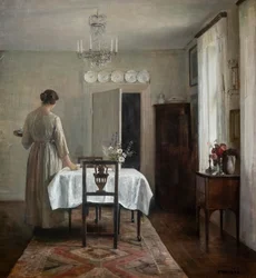 Kunstnerens kone dekker bordet