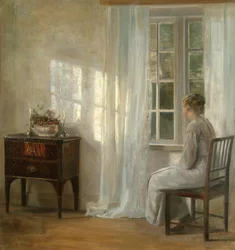 Venter ved vinduet