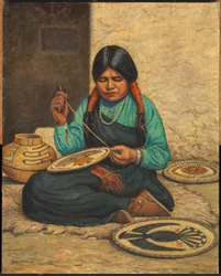 Hopi-kvinne som vever plaketter