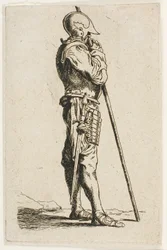 En soldat som står, i profil
