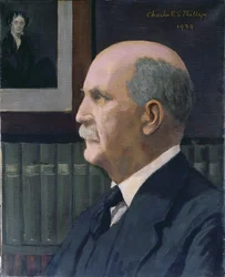 William Henry Bragg (1862-1942) med et bilde av Michael Faraday (1791-1867) i bakgrunnen, 1939