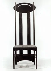 Høystøttet stol, ca. 1897 (mørkbeiset eik med rushsete og gjennomborede ovale ryggskinner)