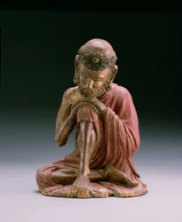 Rød lakkfigur av Sakyamuni, grunnleggeren av den buddhistiske troen, som dukker opp fra fjellene, Yan-dynastiet, 1280-1368 (tre og forgylt)