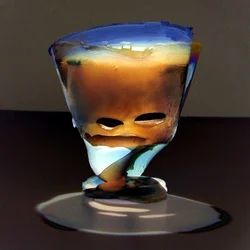 Smeltende glassansikt