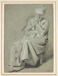 Sittende kvinne